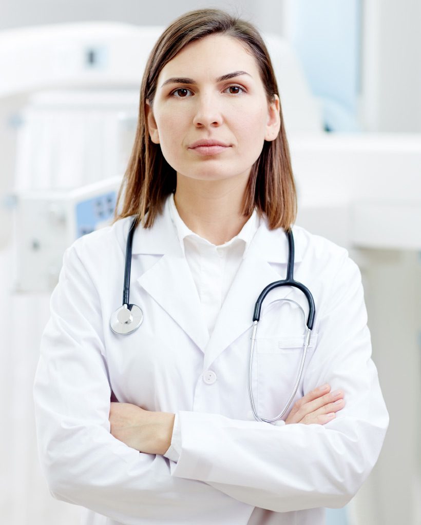 Orthopedic surgeon at Orthopedic Associates reviewing a patient referral